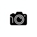 Czarna ikona aparatu fotograficznego na białym tle.